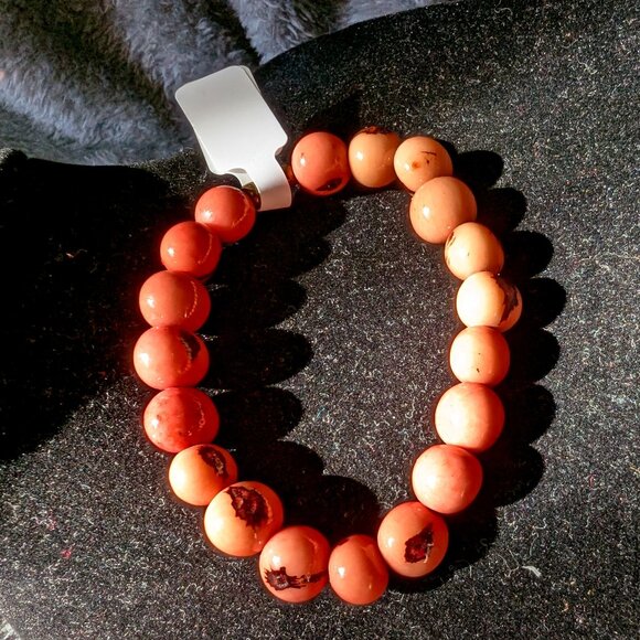 Native American coral beads are salmon and brown on elastic #43 - Picture 1 of 1